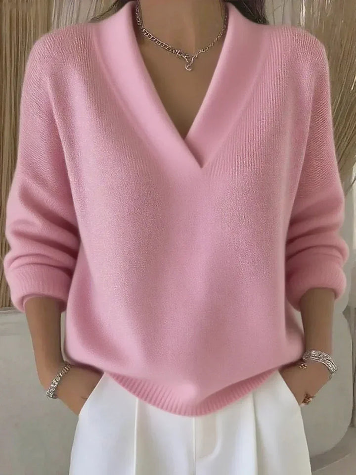 Clara | Miękki różowy sweter V-neck w luźnym kroju