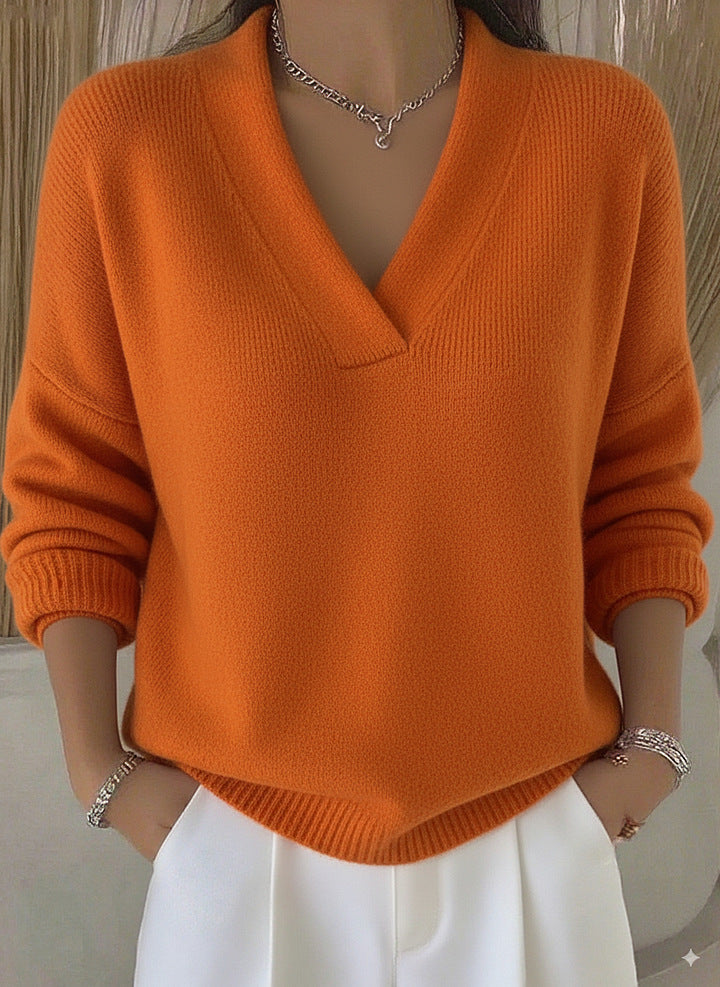 Clara | Miękki różowy sweter V-neck w luźnym kroju